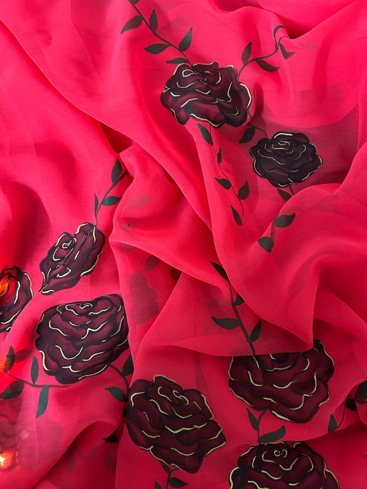 red handpainted saree with black rose. Chiffon fabric